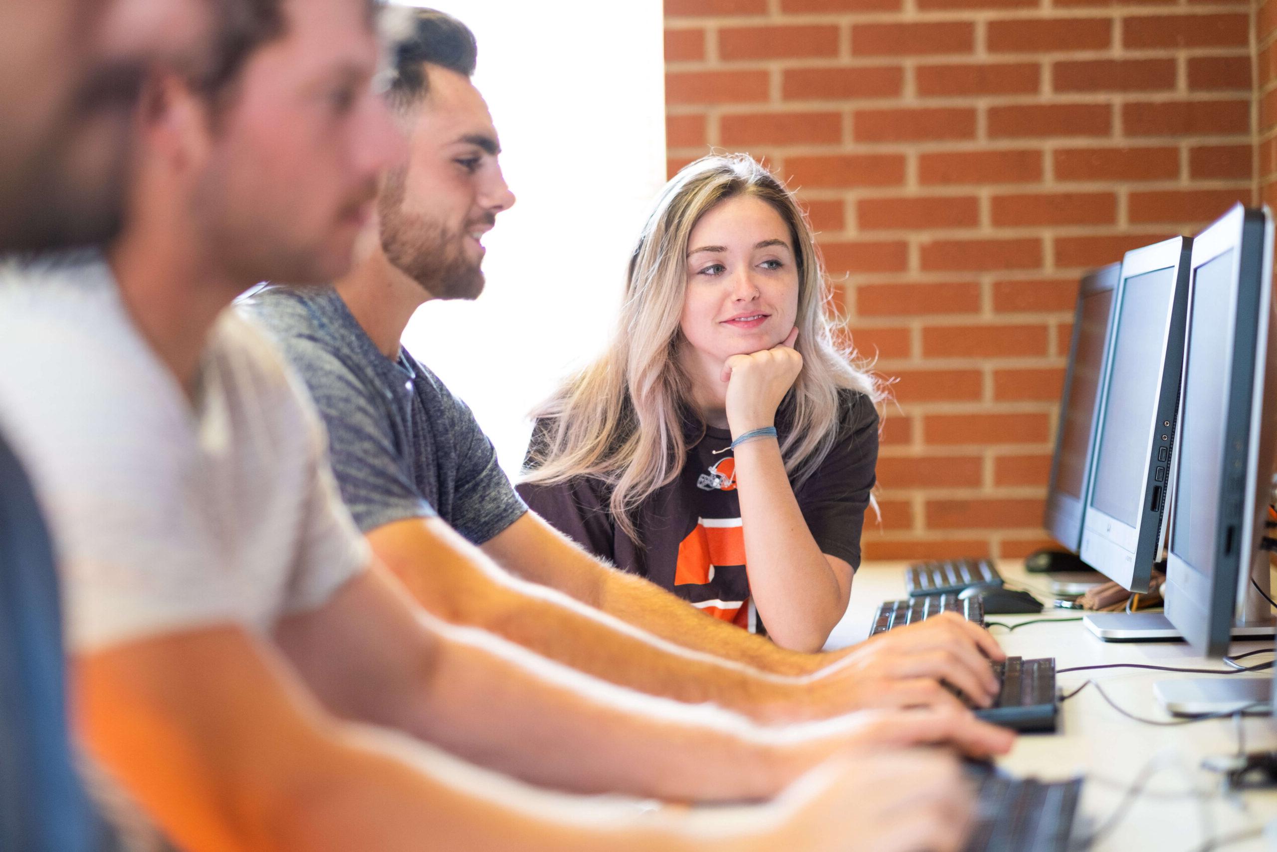 college students at row of computers